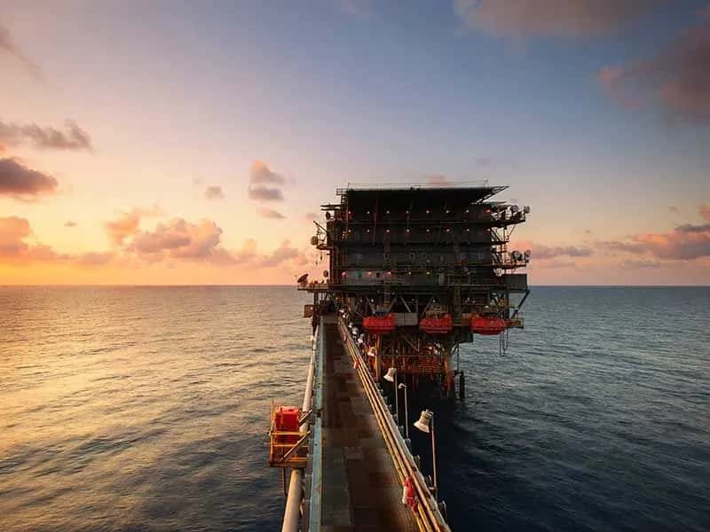 Offshore industrial platform at sunset