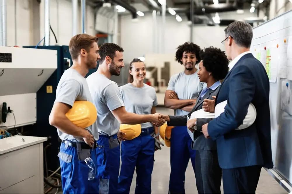 Forbes Marshall team collaborating on the shop floor