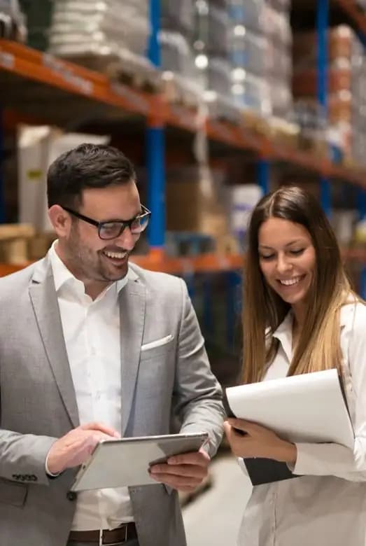 Colleagues collaborating in a warehouse