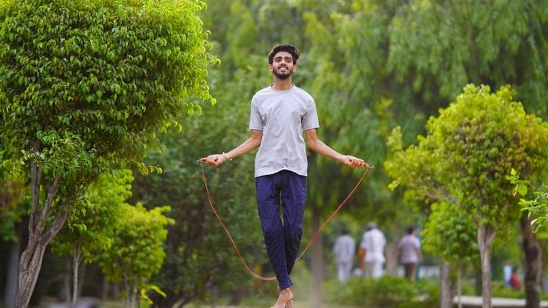 Person jumping rope outdoors